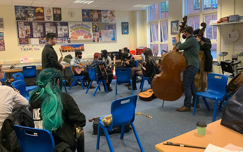 Pupils at school during a music lesson