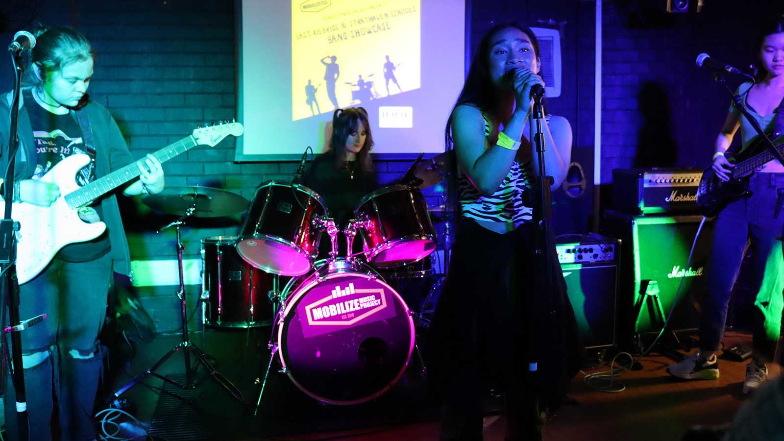 Young musicians performing on stage