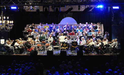 A performance of a large Scottish band at the Royal National Mod